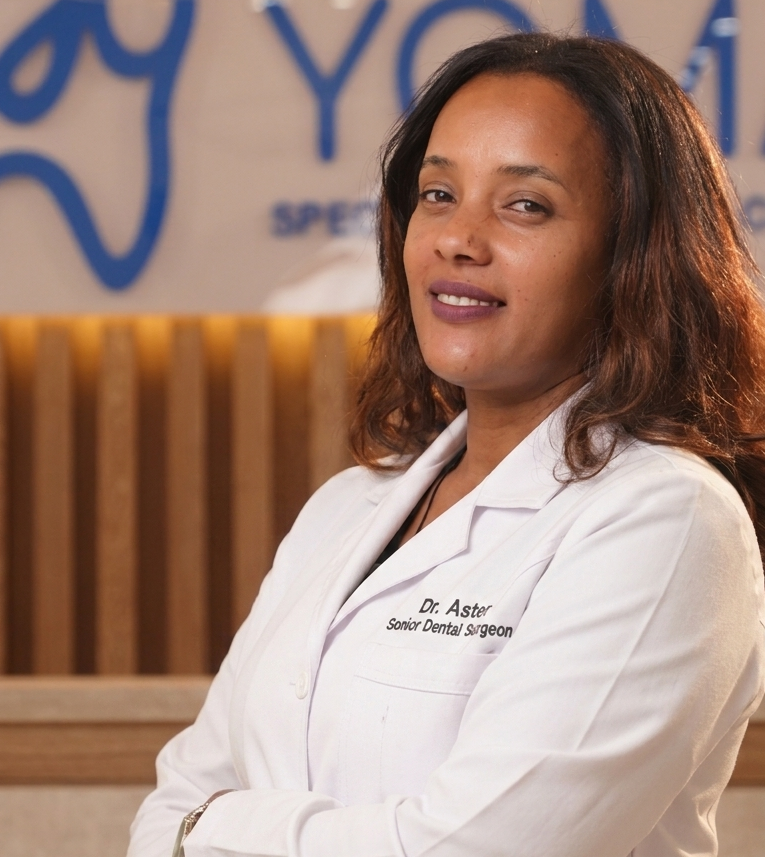 A patient smiling in a modern YOMA dental clinic treatment room